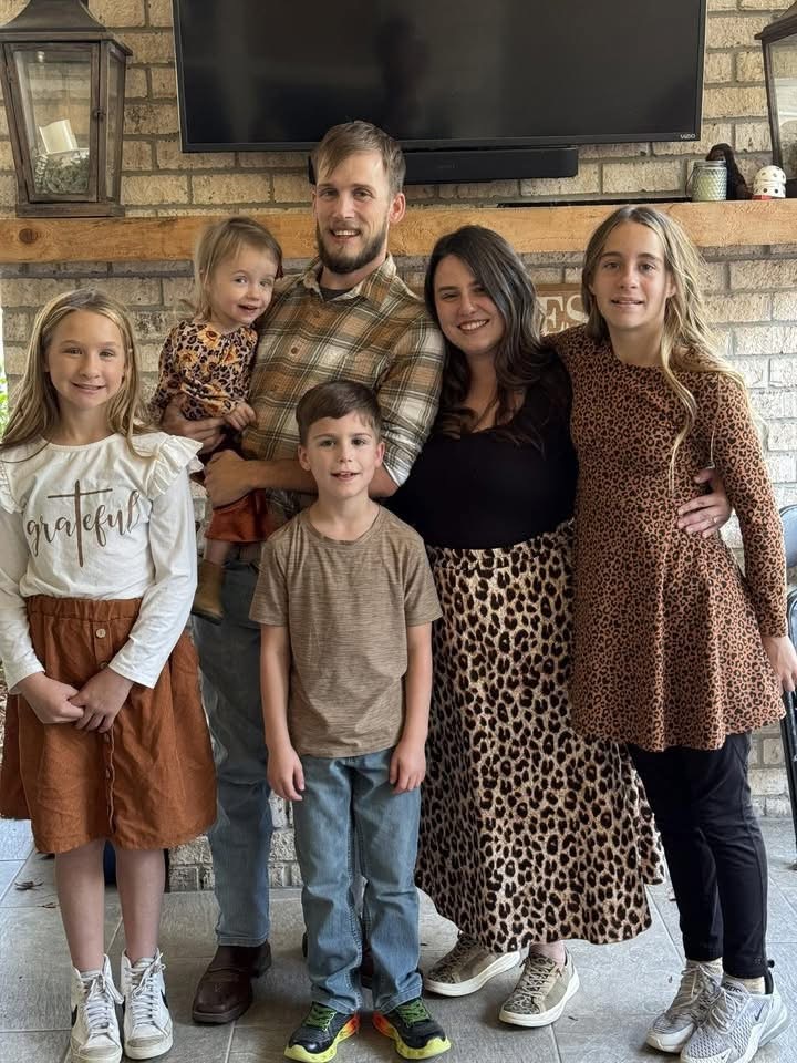 Alvin Holcomb with his wife and children